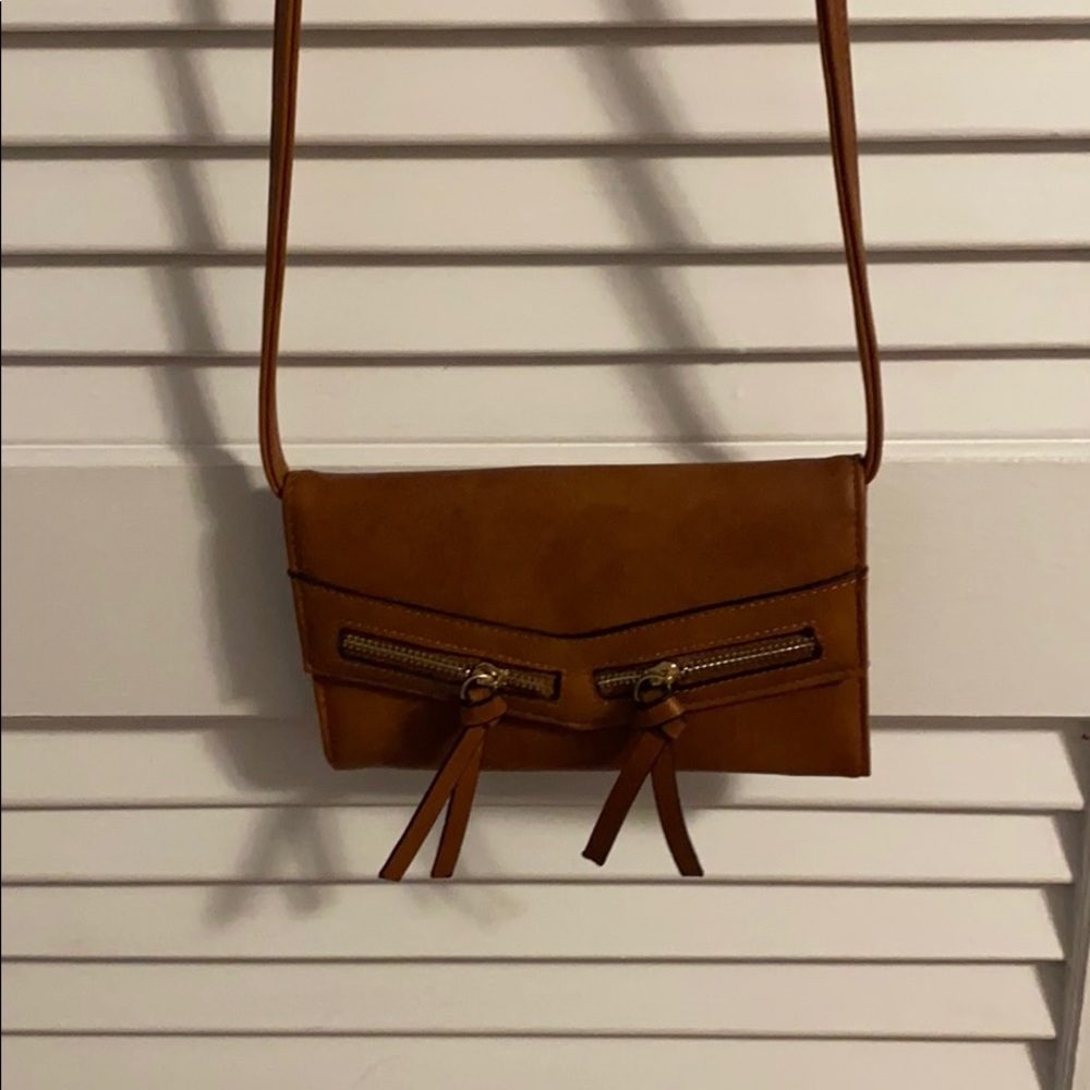 Worn once brown wallet on a chain